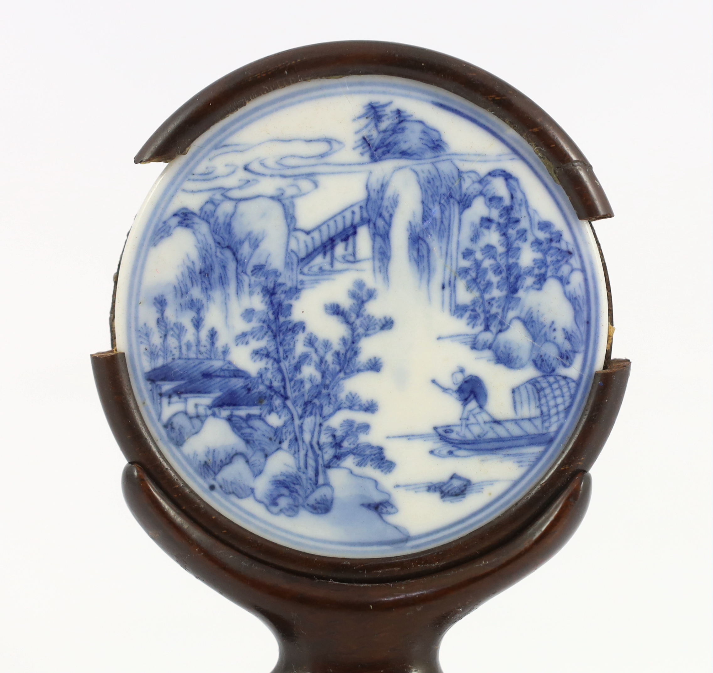 A Chinese blue and white porcelain circular plaque, possibly 17th century